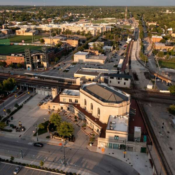 Aerial shot of the Joliet Metra station next to a baseball field