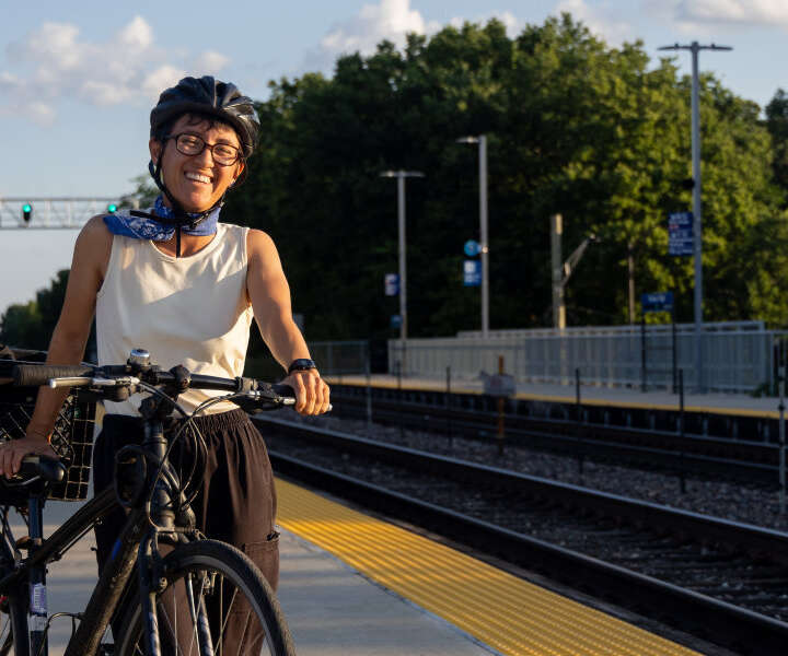 Person at station with bicycle